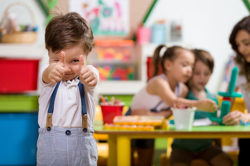 Preschool,Student,Posing,In,Classroom