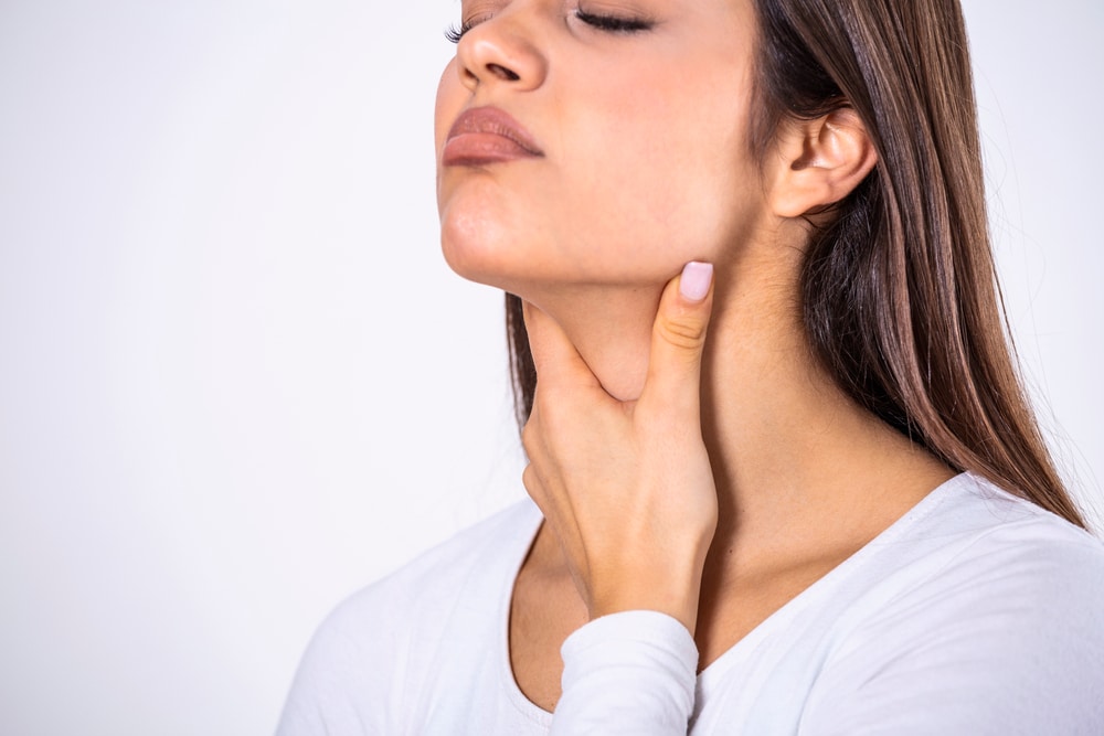 Young,Beautiful,Woman,Suffering,From,Pain,In,Throat,,Touching,Inflamed